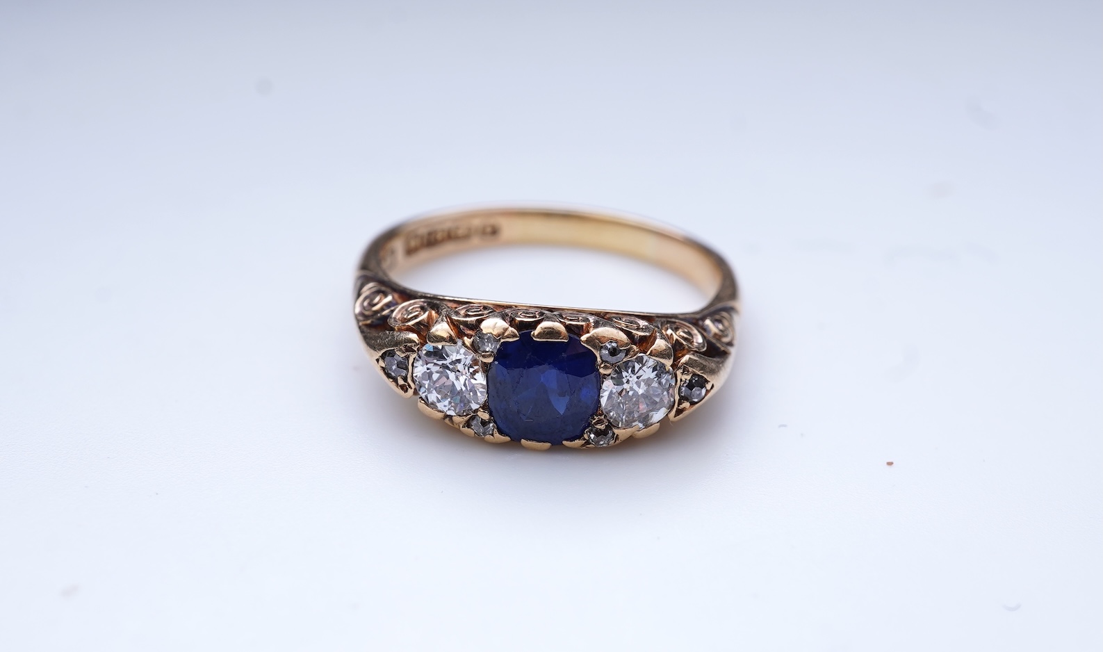 A sapphire and diamond ring, circa 1902